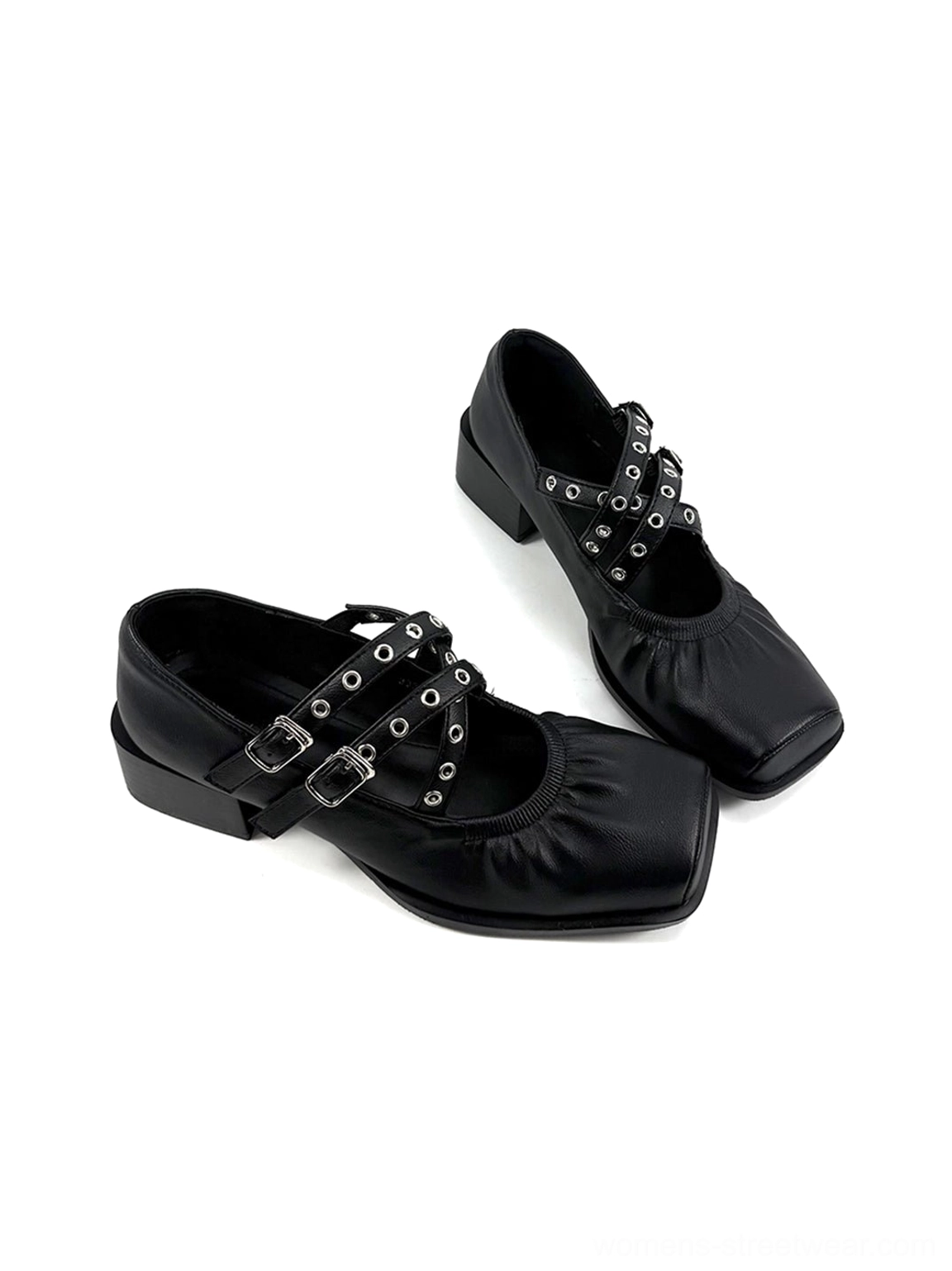 Pair of black square-toe double-strap Mary Jane flats displayed in an angled flat lay product view
