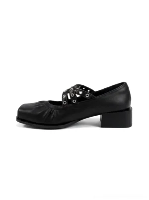 Black square-toe double-strap Mary Jane flats side view with ruched toe silver grommet buckles and low block heel