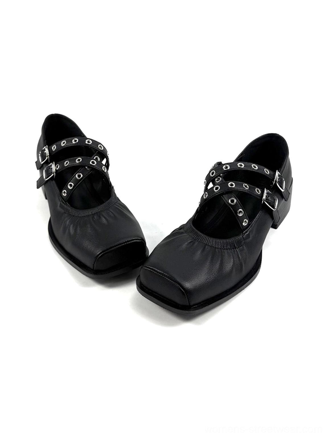 Black square-toe double-strap Mary Jane flats with silver grommets and low block heel detail view