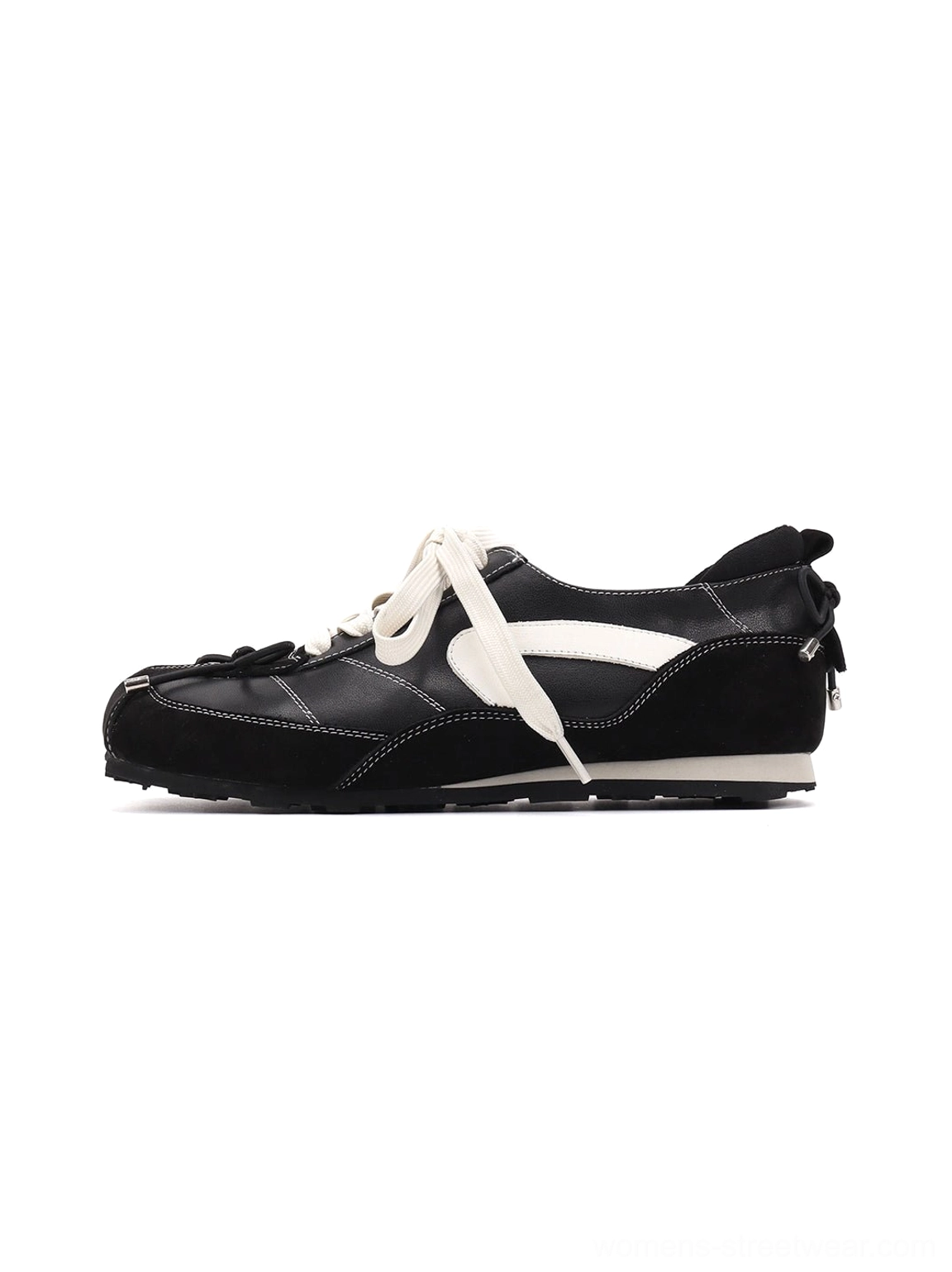 Black square-toe sport ballet flat viewed from the side with white contrast laces, leather upper, and low-profile rubber sole