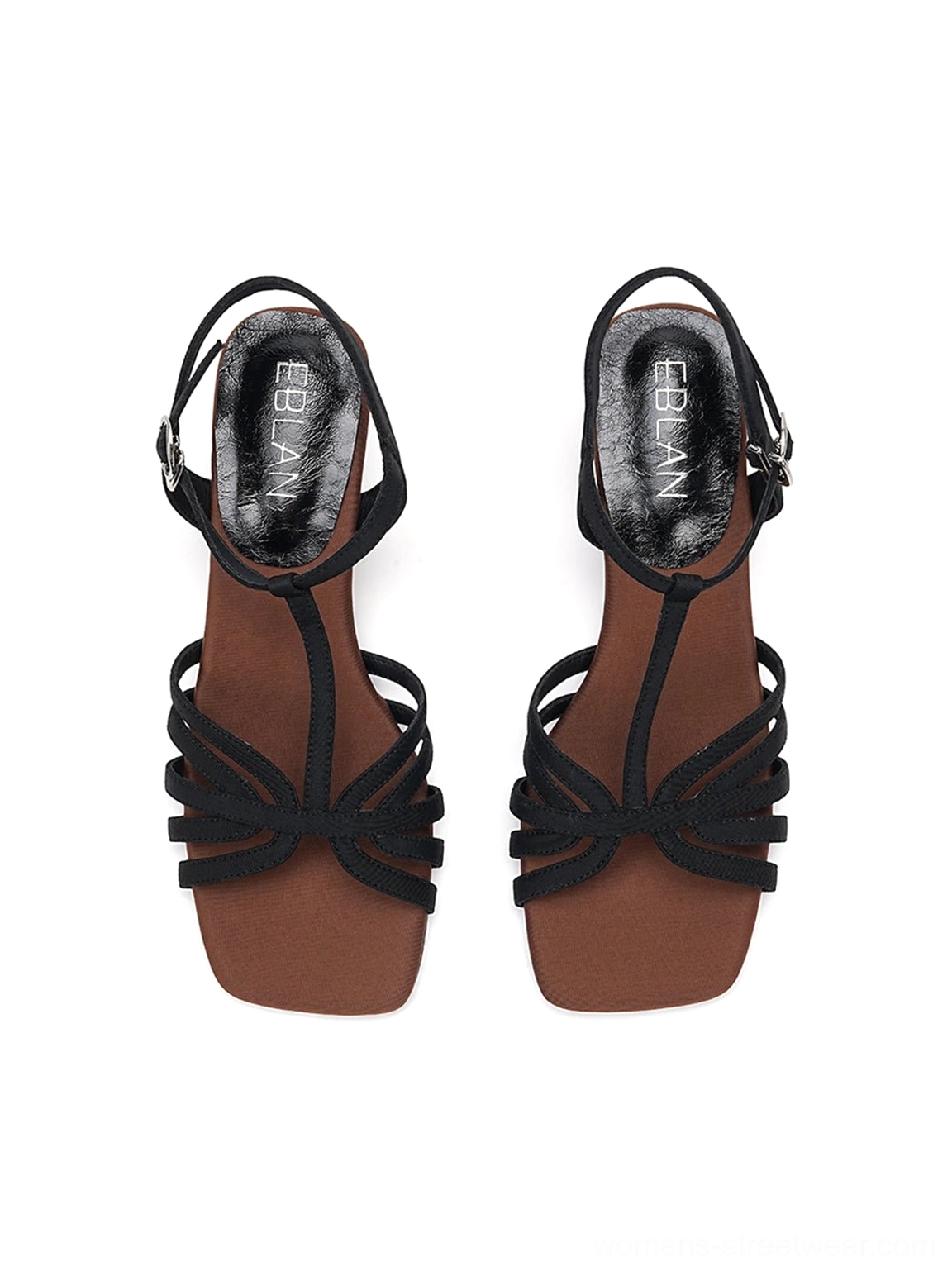 Direct overhead view of black square-toe woven T-strap sandals with brown insole and open front design