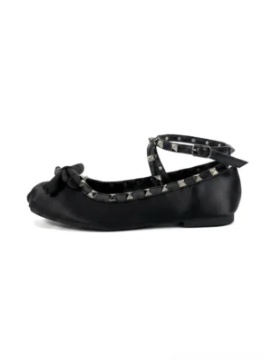Black studded bow satin lace-up ballet flat in left side profile showing the rounded toe, satin upper, ankle buckle strap and pyramid metal studs
