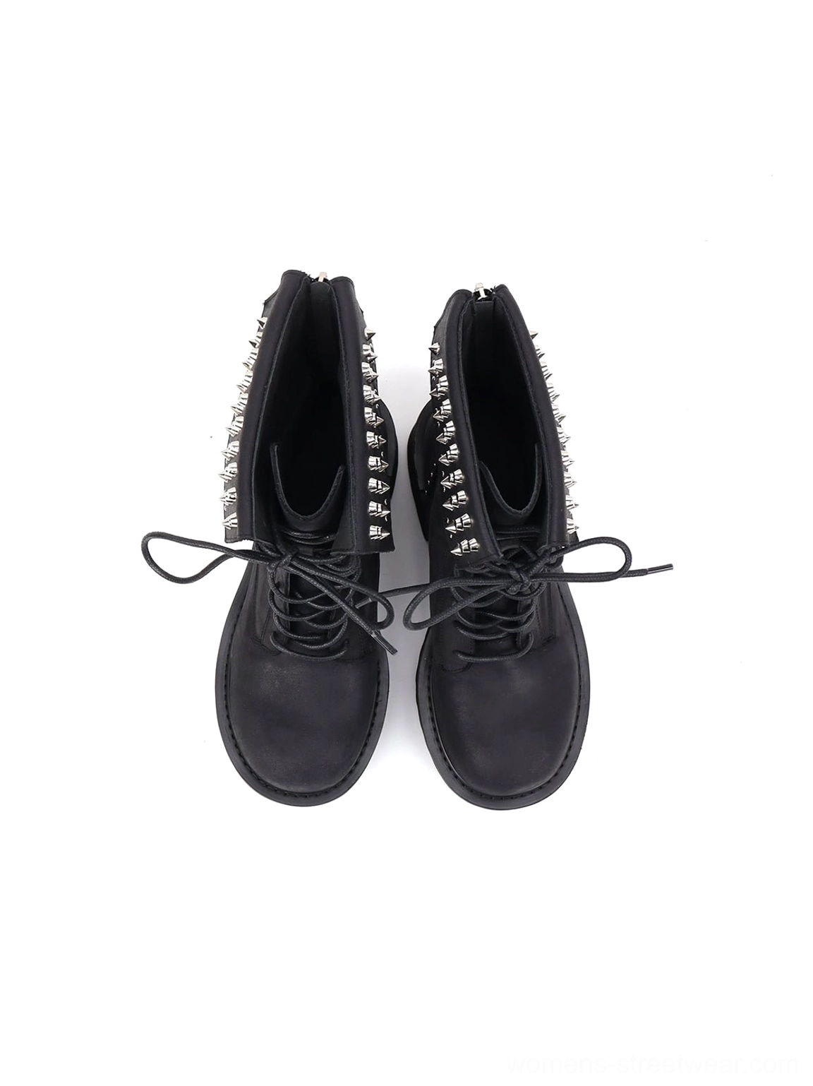 Top-down view of black studded combat boots showing the inner lining, open ankle cuffs, loose laces, and platform outsole