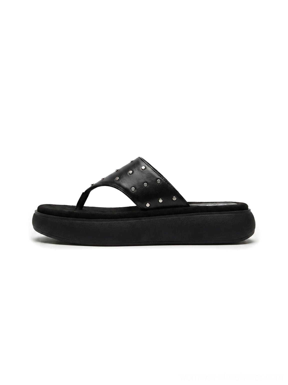 Black leather platform thong sandals with silver-tone rivets shown from above on a clean background