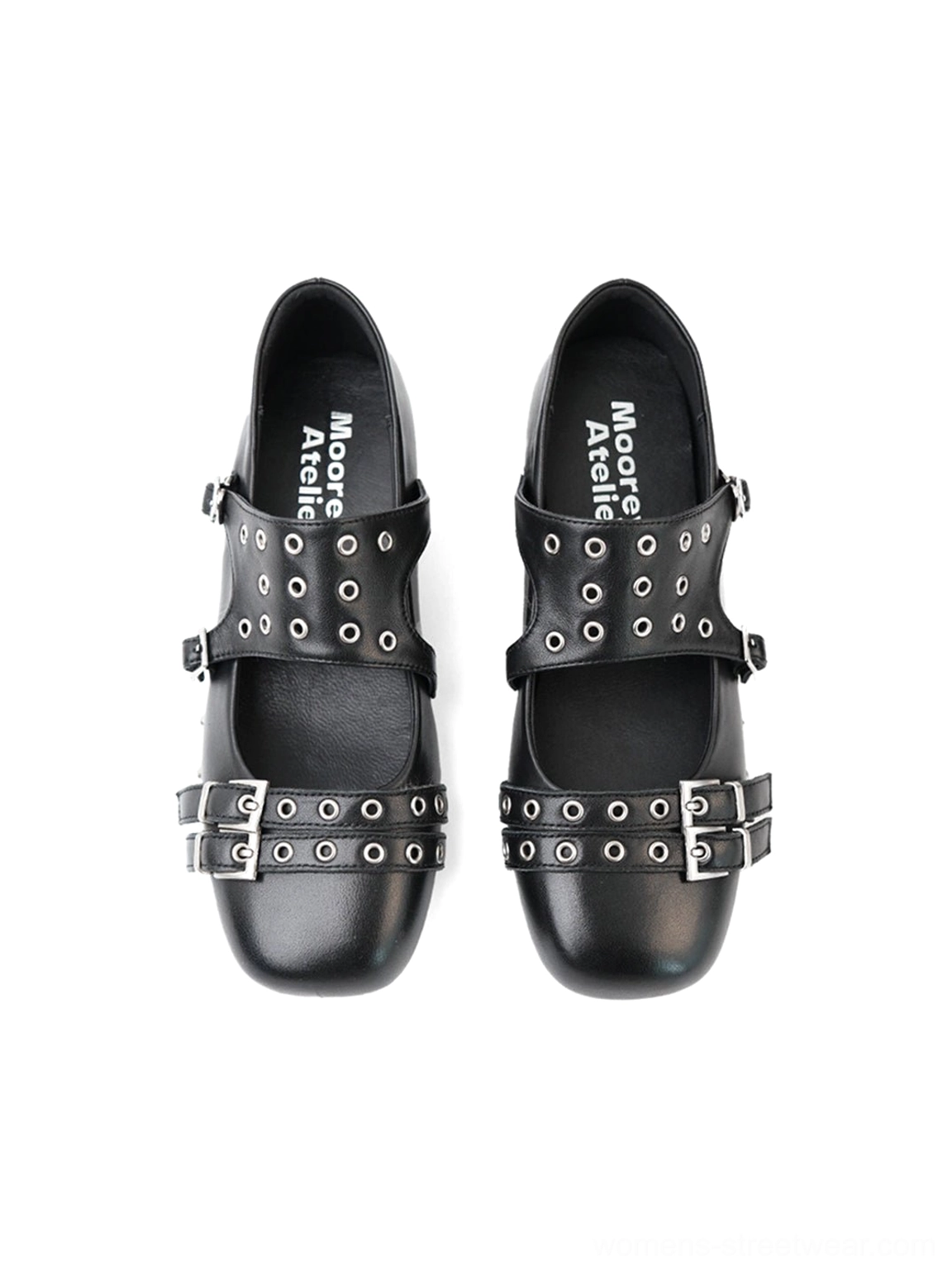 Black studded platform Mary Jane flats featuring a rounded toe and bold platform sole profile