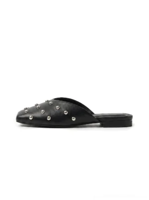 Black studded pointed-toe mule flat with silver-tone round rivets, smooth upper, and open-back slip-on silhouette shown from the side