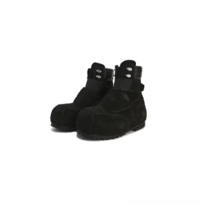 Black suede-textured strap platform winter boots shown from a front three-quarter angle with rounded toe, layered ankle straps, dual metal buckles, and chunky outsole