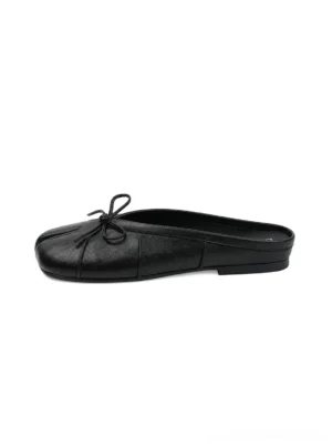Black split tabi toe bow strap slip-on mules shown from a top view with a low-profile flat sole