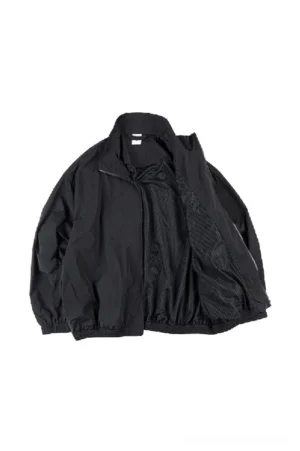Black techwear windbreaker jacket shown open with breathable mesh lining and dropped shoulder design