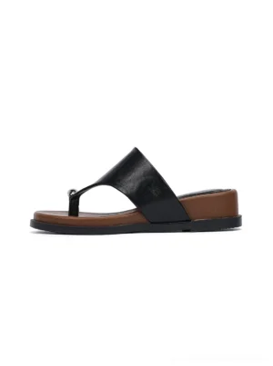 Black toe ring platform slide sandals side profile with smooth upper brown low wedge sole and silver toe loop hardware