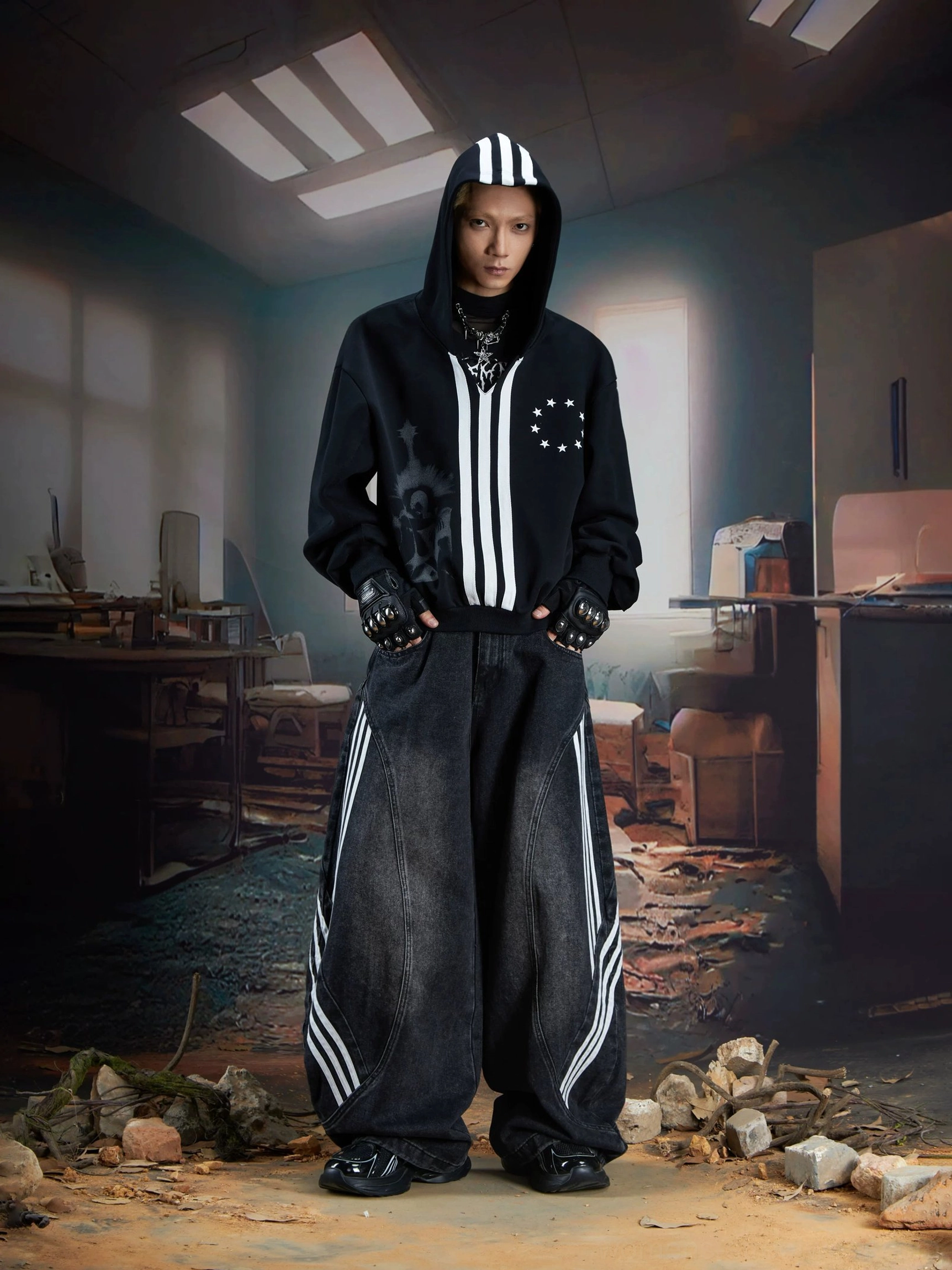 Full-body front styling of black triple-stripe balloon jeans paired with a matching striped hoodie, tactical gloves, and Korean streetwear accessories