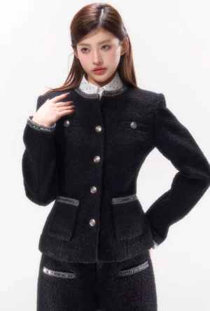 Black tweed button blazer with stand collar metallic buttons braided cuff and pocket trim styled in a Korean streetwear tailored suit look