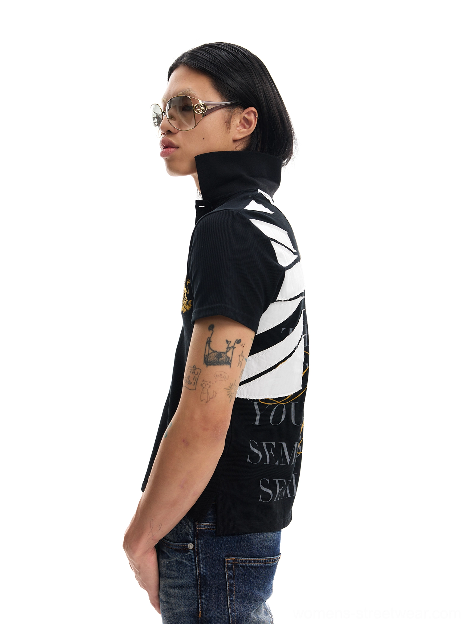 Black Union crest graphic polo shirt side profile showing classic collar chest embroidery and back print