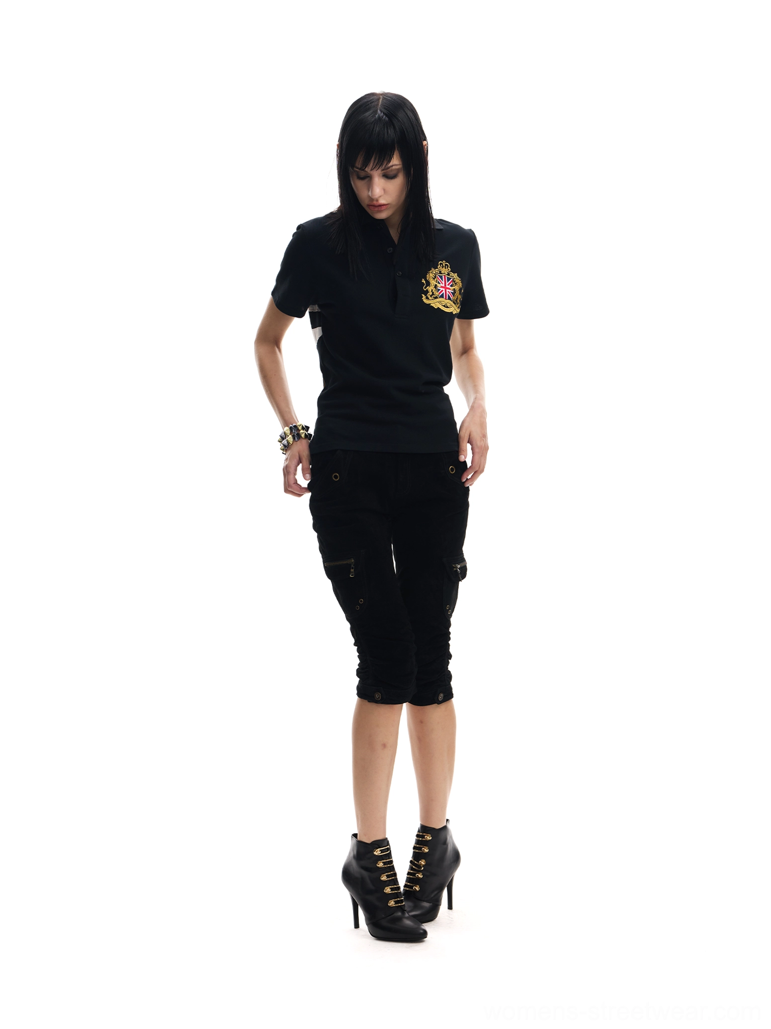 Black short sleeve Union crest polo shirt styled with cropped pants and heeled boots full front outfit view