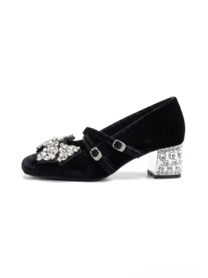 Black velvet crystal bow block heel Mary Jane pumps side profile showing rhinestone bow and jeweled heel