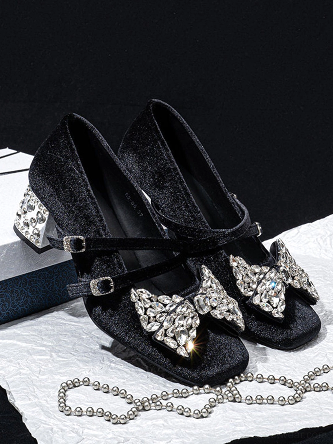 Black velvet crystal bow block heel Mary Jane pumps elegant studio product detail view