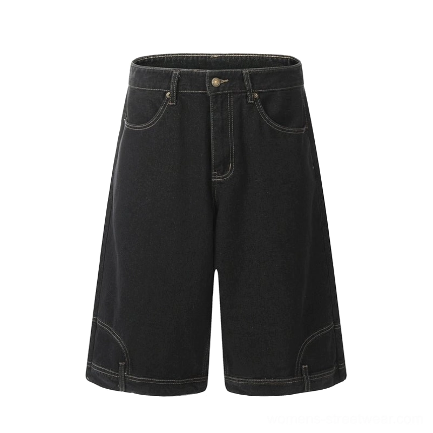 Flat lay front view of black washed denim culotte shorts with wide cropped legs, classic five-pocket structure, precise topstitching, and streetwear styling