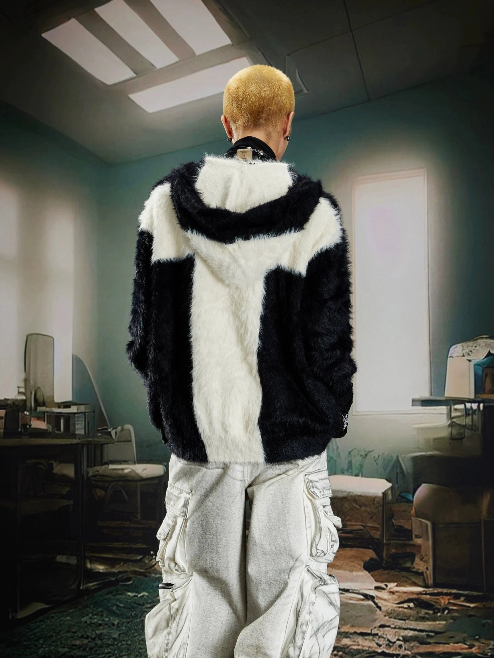 Black and white color block faux fur hooded jacket with contrasting cross inspired panels