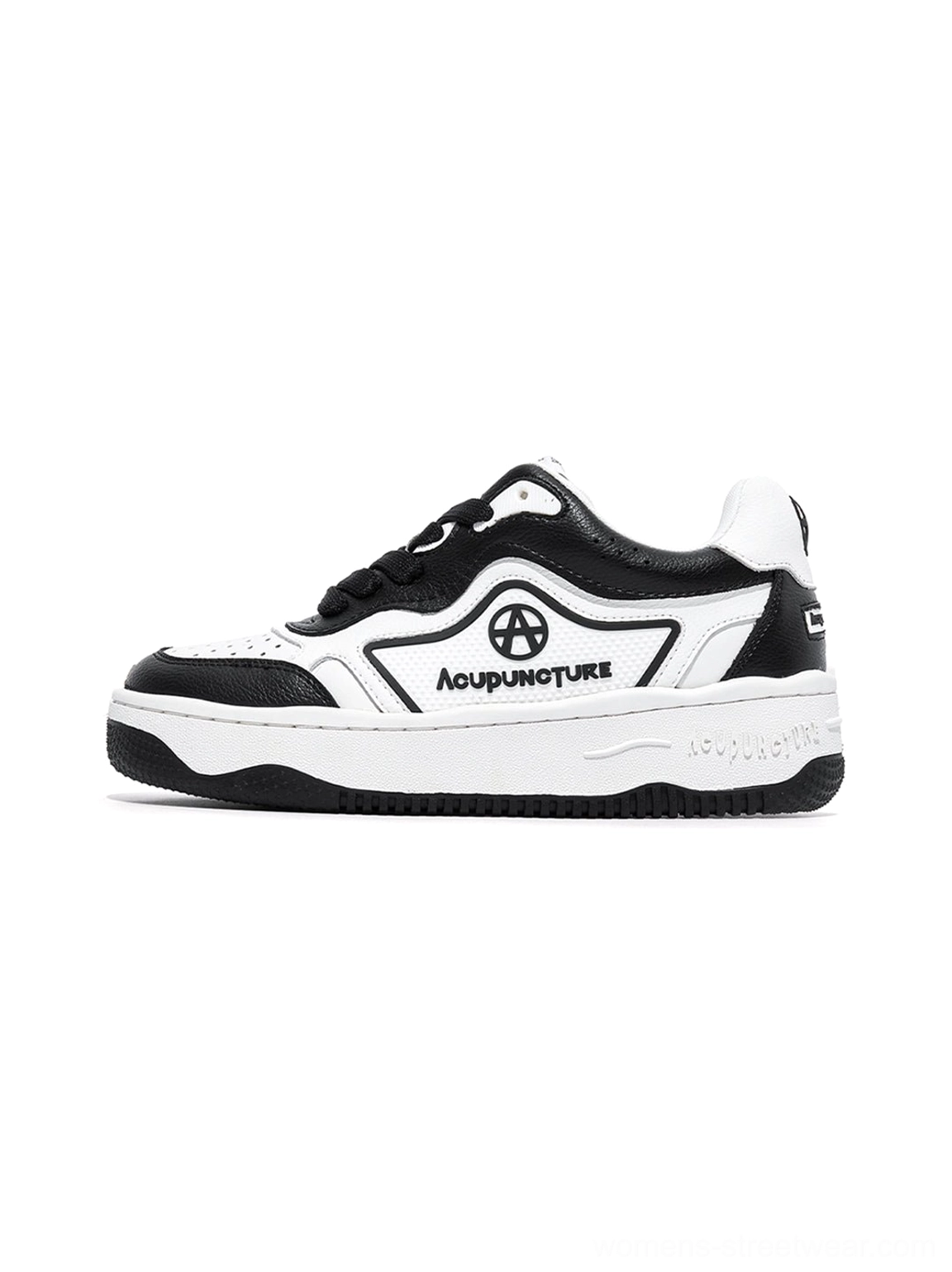 Black and white logo skate sneakers shown from the front on a clean white background with chunky rubber soles and contrast panel details