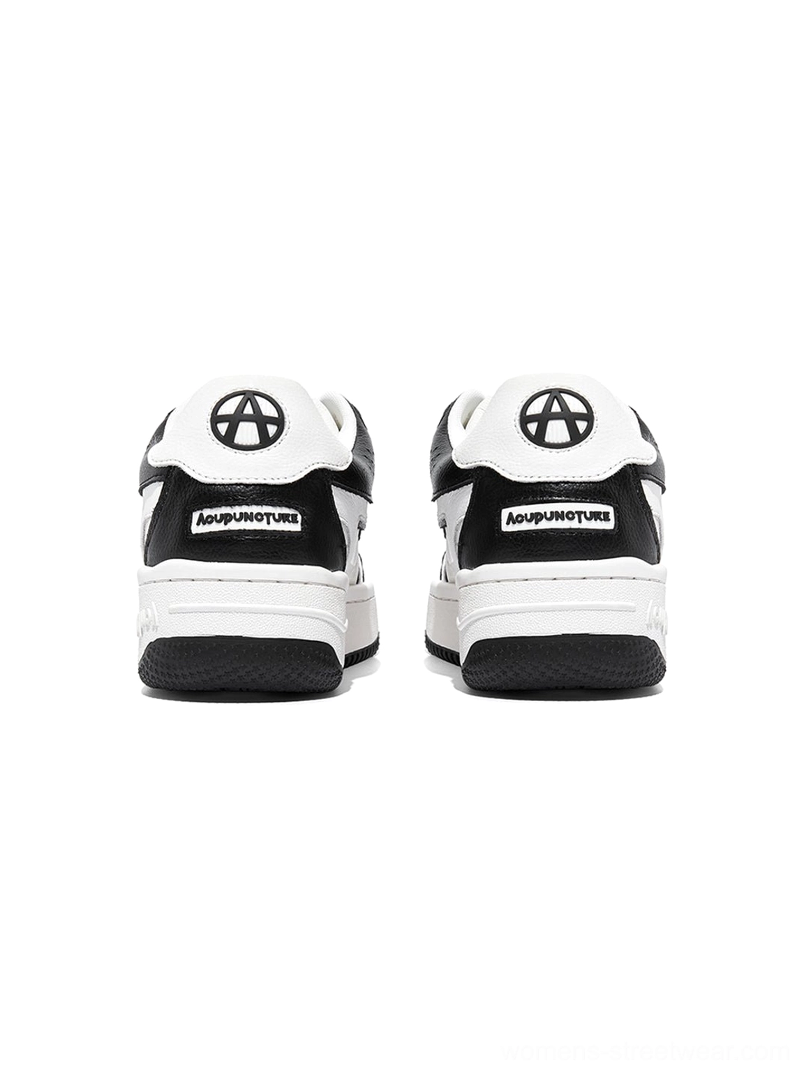 Rear heel view of black and white skate sneakers featuring graphic heel panels and a layered monochrome design