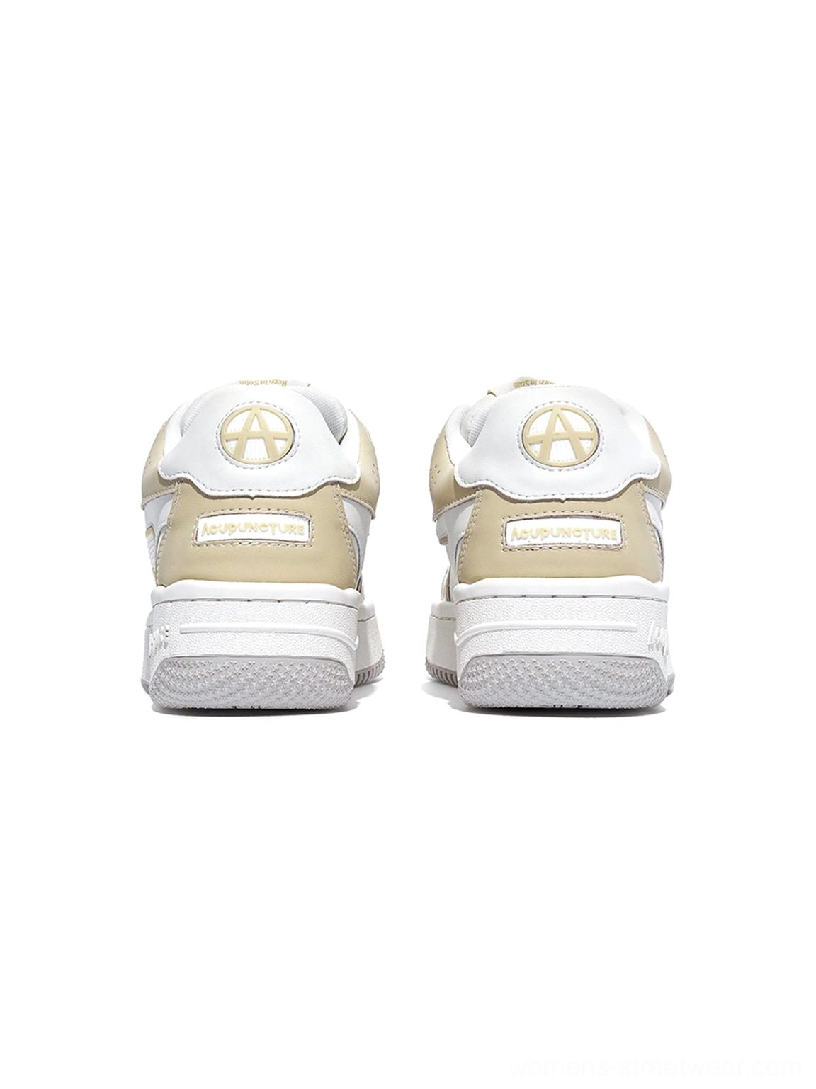 Black and white platform skate sneakers with contrast stitching and a bold streetwear-inspired silhouette