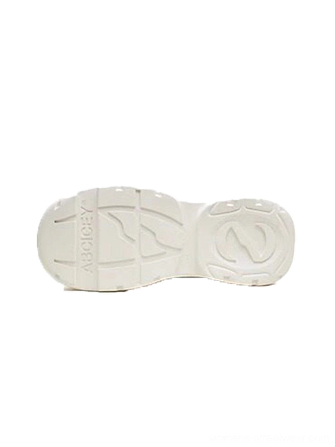 Top-down view of the textured outsole on black and white platform canvas sneakers showing embossed sole detailing and anti-slip tread pattern