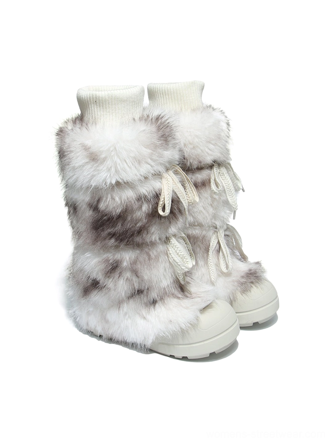 Black and white plush-lined tall platform boots with elevated streetwear silhouette