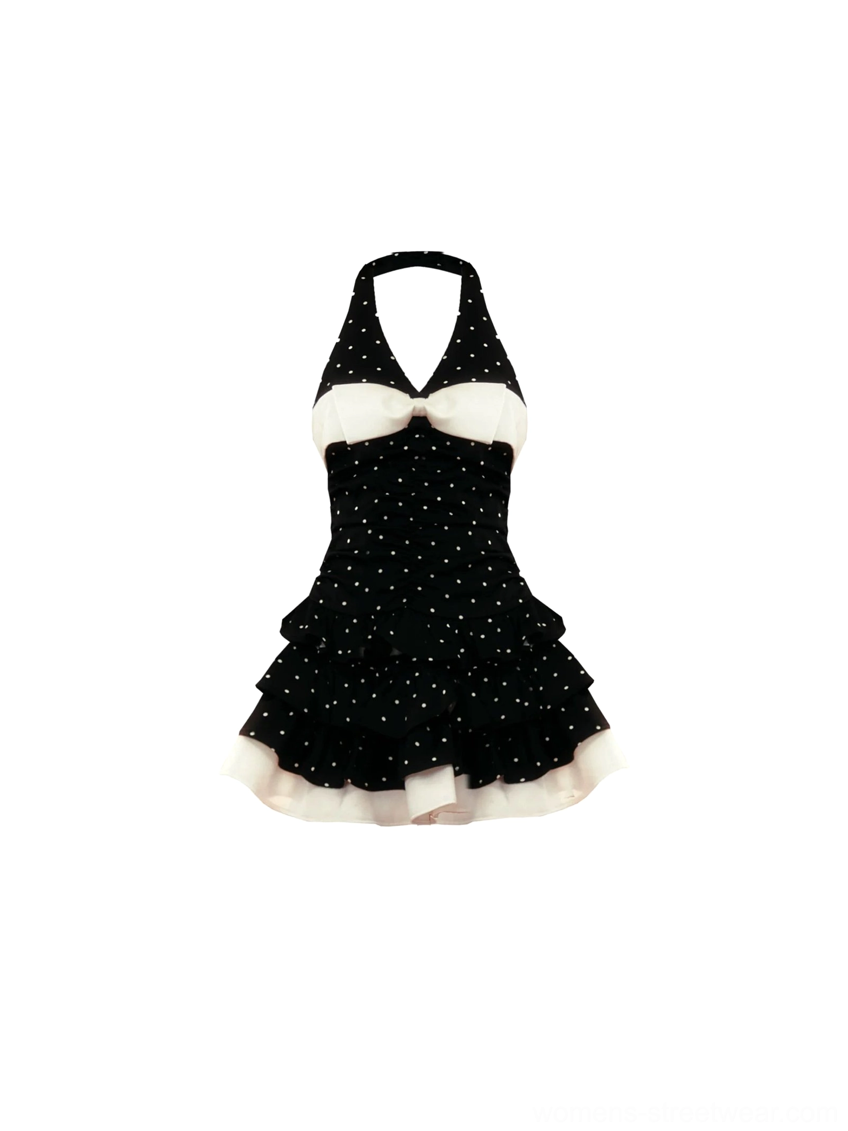 Front flat lay of a black and white polka dot halter swim dress with contrast bow and tiered ruffle skirt