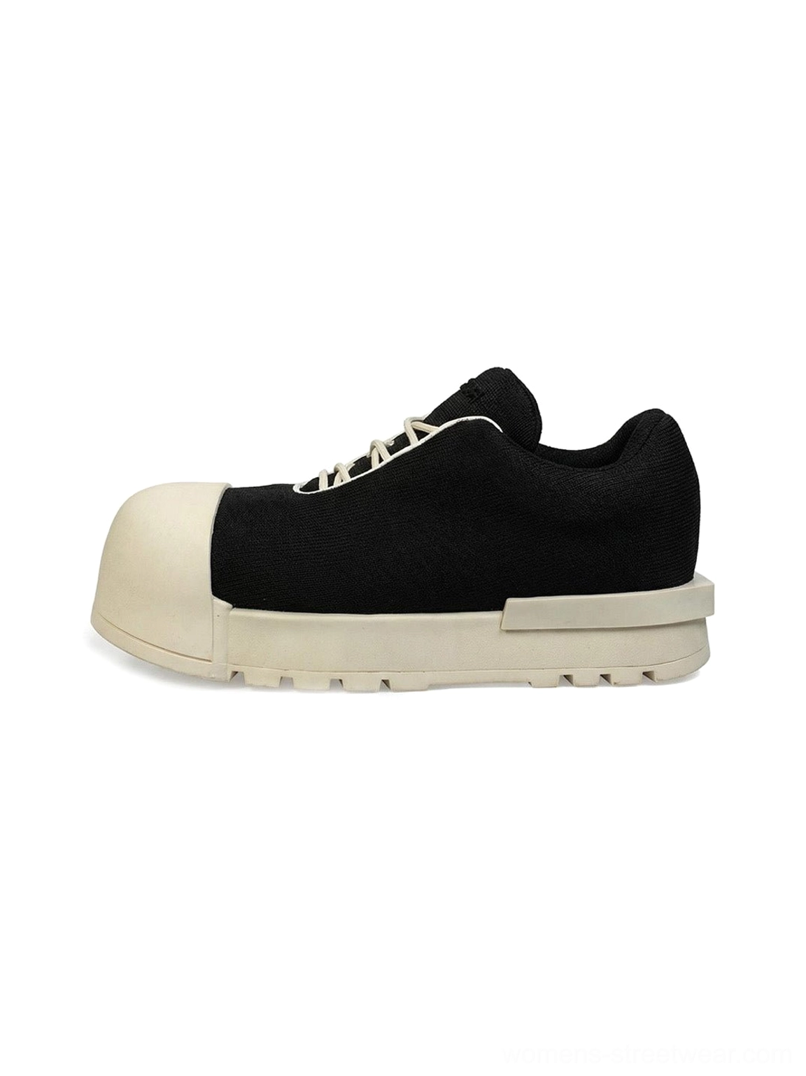 Black and white sculpted toe chunky platform low boots left side studio view showing oversized off-white toe cap and lug sole