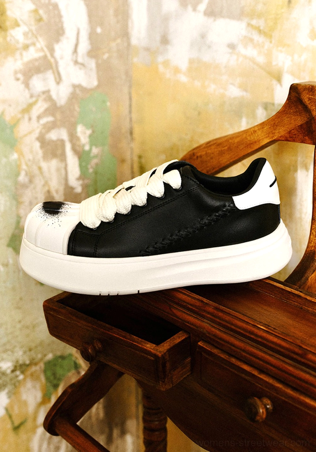 Black and white shell toe platform derby sneakers product image highlighting the chunky monochrome streetwear silhouette and raised platform outsole