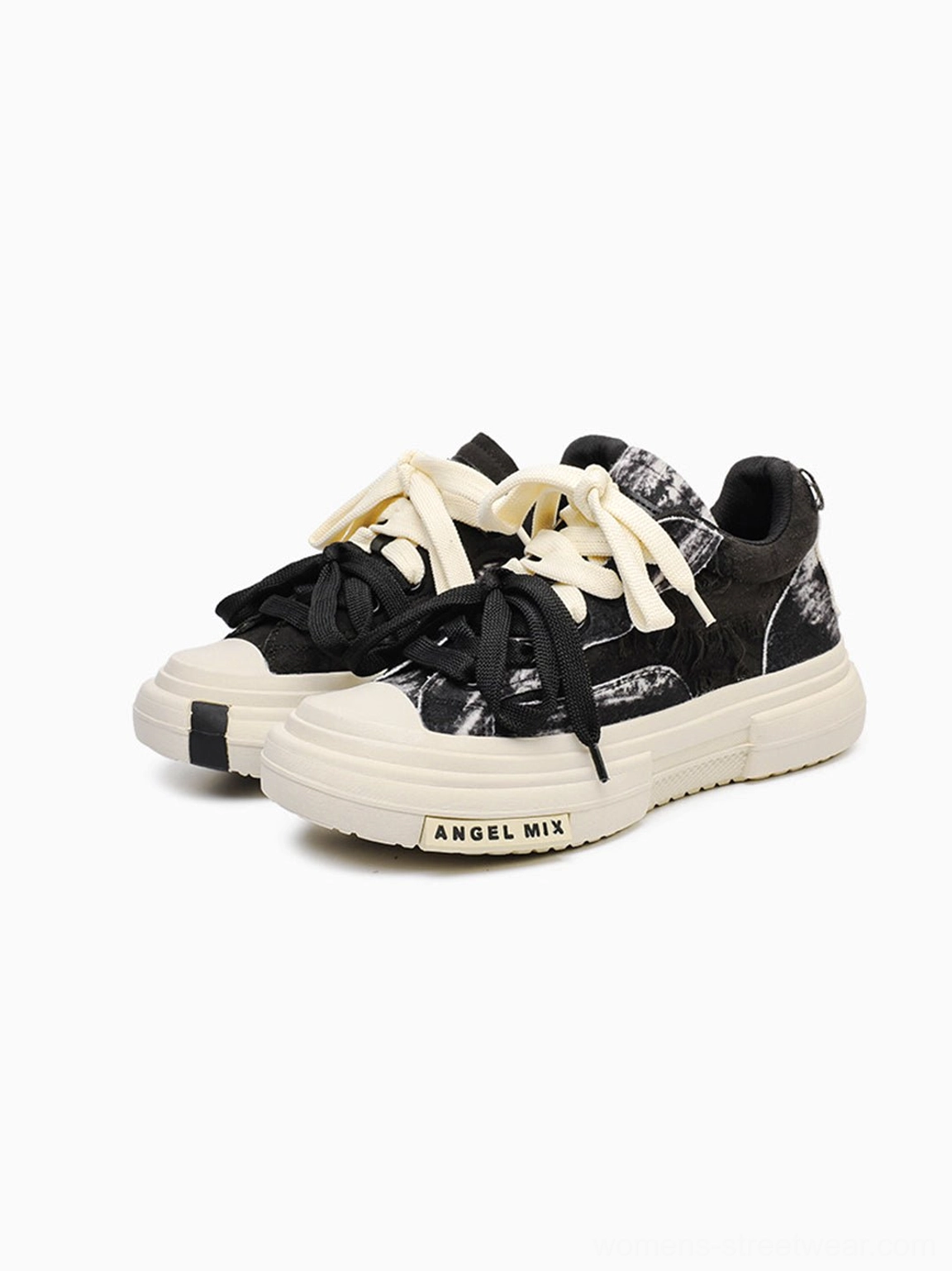 Black and white tie dye canvas platform sneakers with a bold lifted sole for Korean inspired casual streetwear outfits