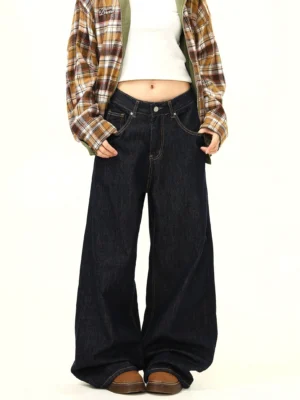 Front view of black wide leg mid waist jeans featuring classic front pockets button fly and relaxed Korean streetwear styling