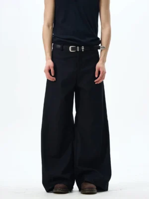 Front full-body view of black wide-leg skater pants with an ultra high-waisted oversized streetwear silhouette