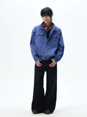 Black wide-leg streetwear pants styled with a blue work shirt and red bandana for a layered skater outfit