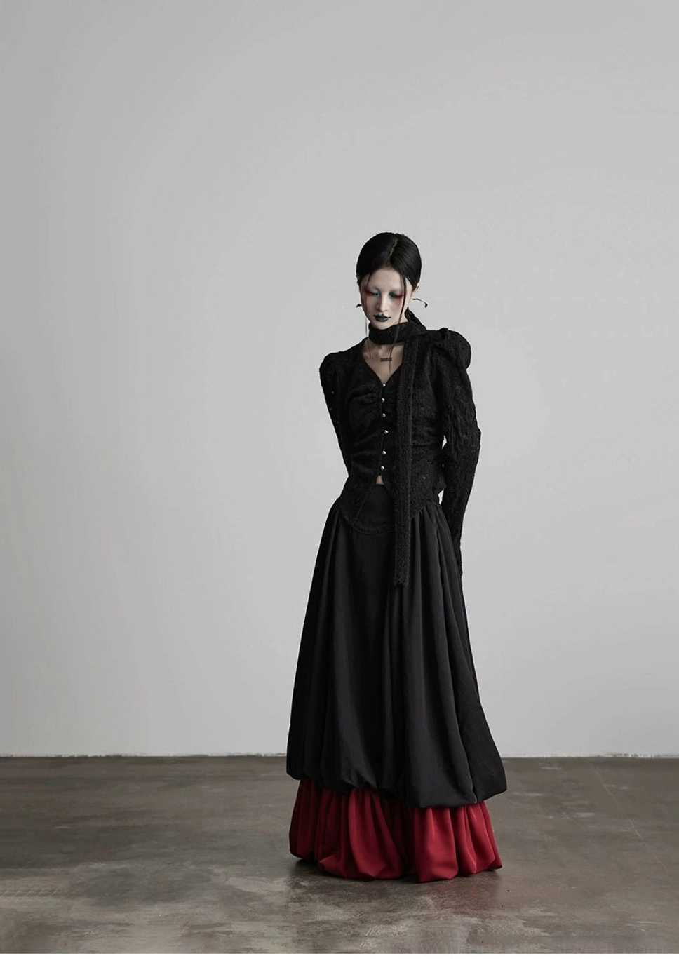 Full front styling view of black and wine red gothic faux two-piece A-line maxi skirt