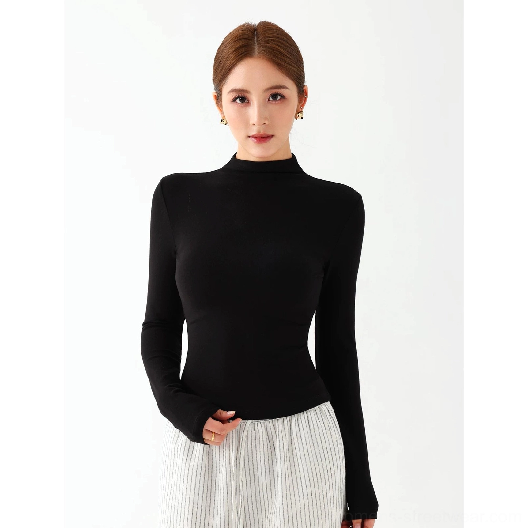 Black women's mock neck slim fit long sleeve knit top for minimalist streetwear outfits