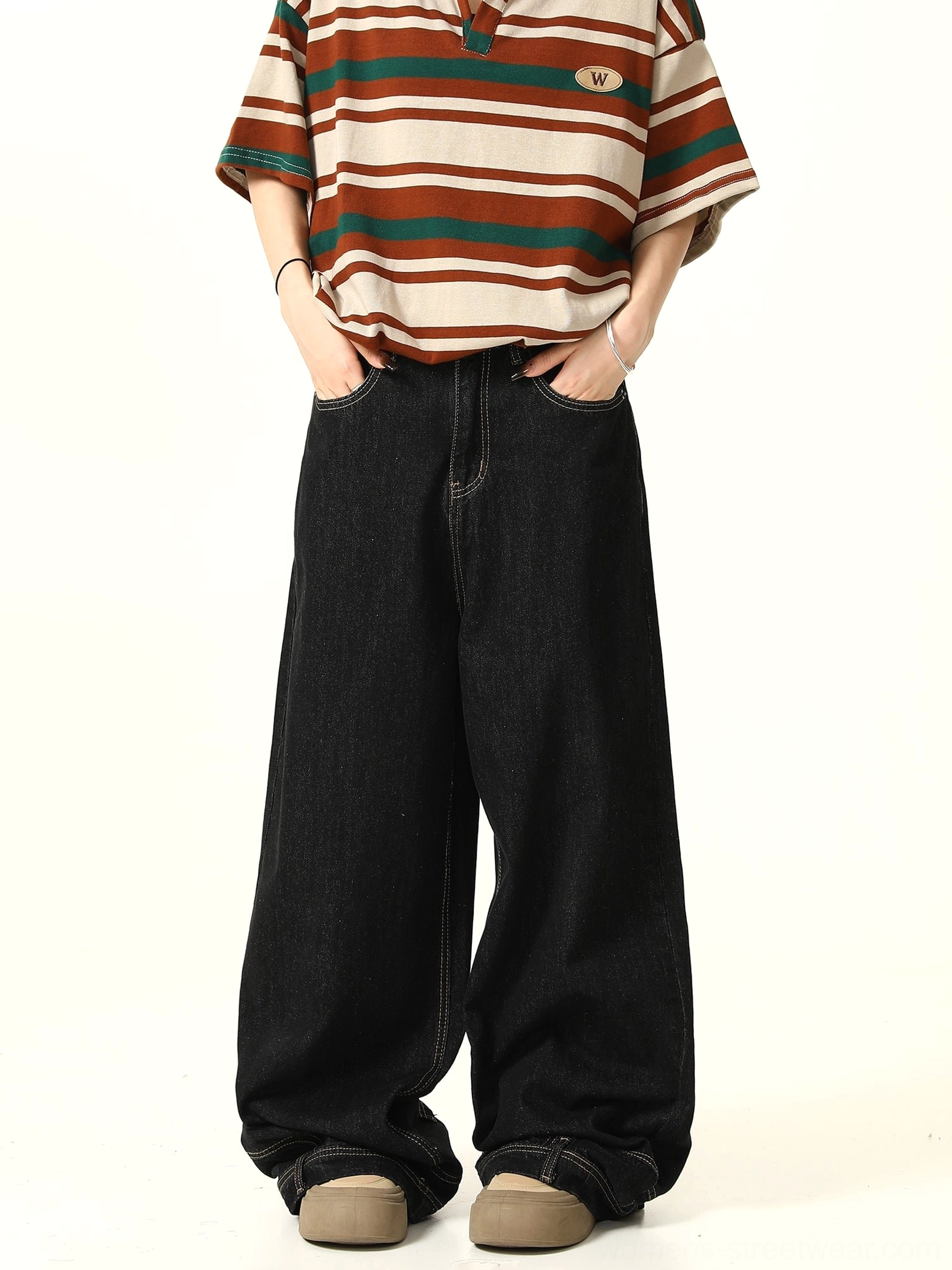Black Y2K baggy wide-leg jeans product image showing high-waisted oversized denim silhouette and long relaxed streetwear hem