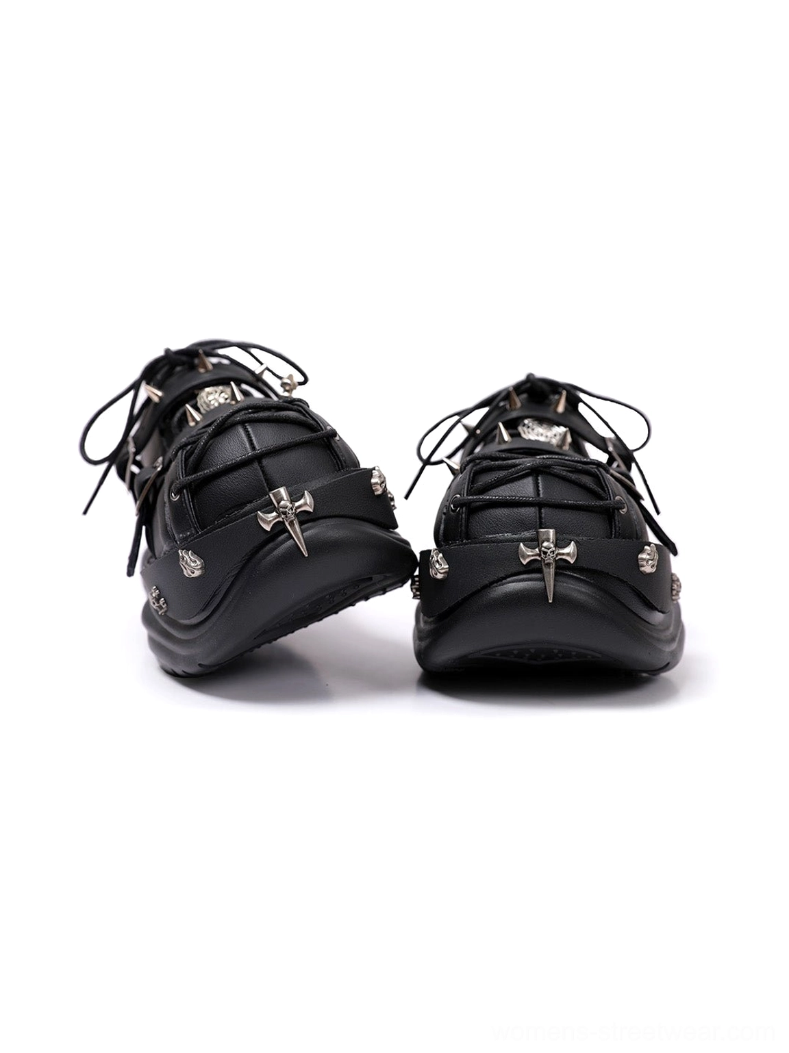 Black Y2K punk platform sneakers featuring decorative buckles, metal details, lace-up cage styling, cross-inspired toe charms, and chunky soles