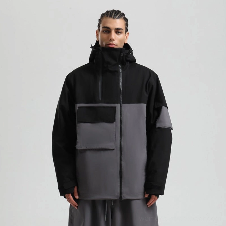 Black and grey multi tone technical snowboard jacket with oversized utility pockets