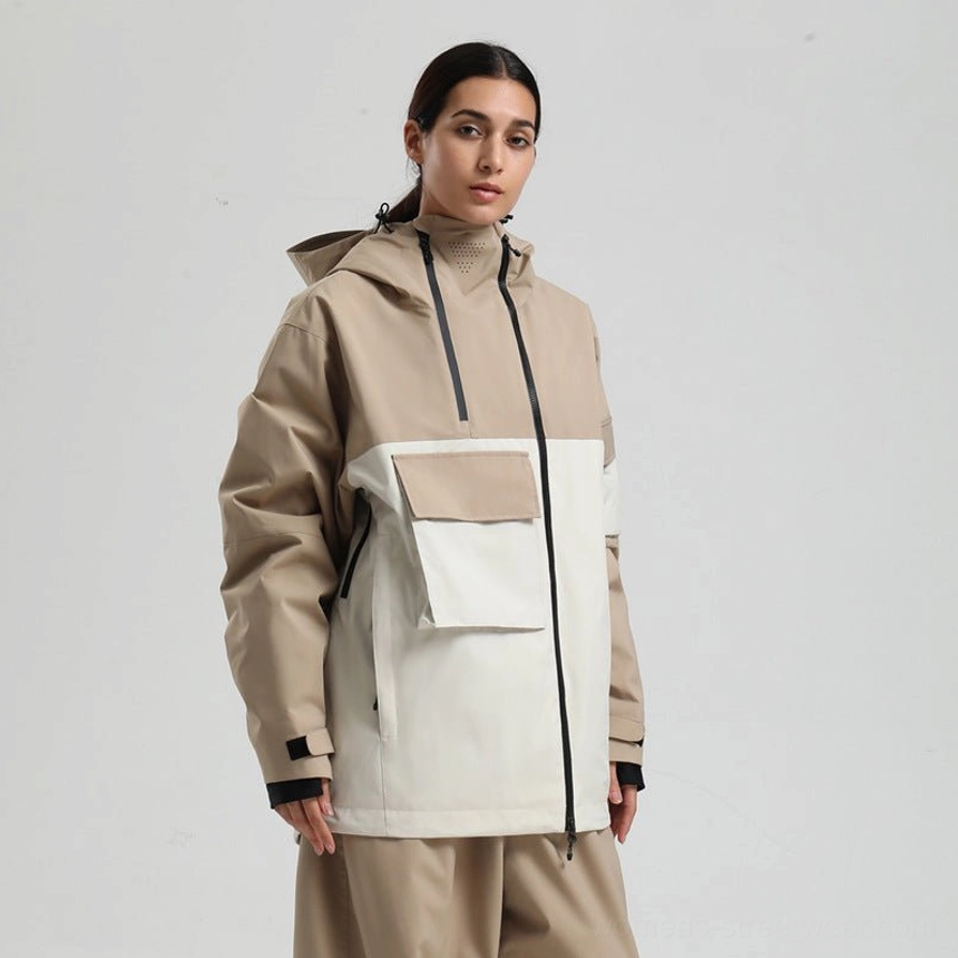 Khaki and off white color block tech snowboard jacket styled with loose snow pants