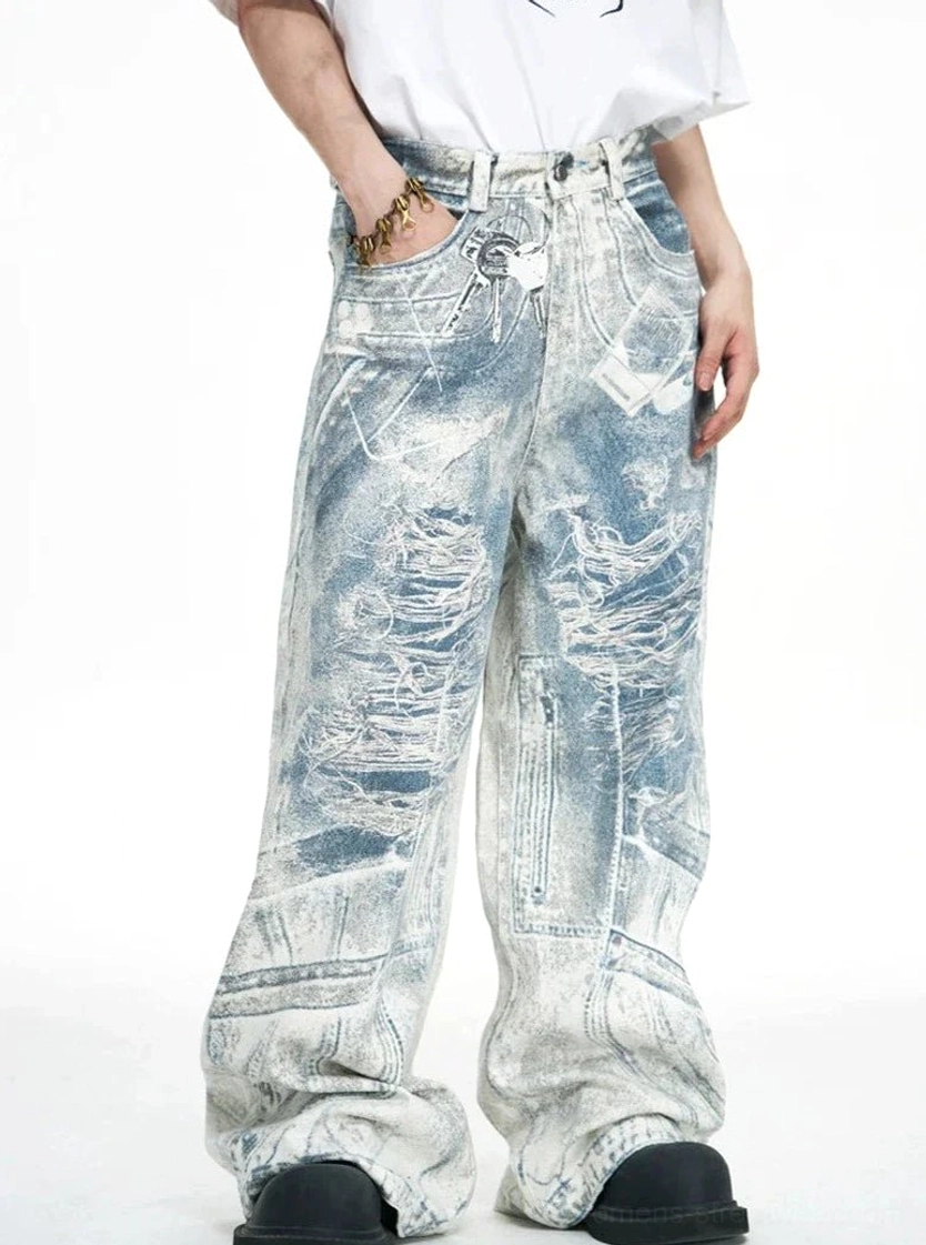 Side front view of blue acid-wash wide-leg baggy jeans featuring distressed denim, detailed waistband hardware, and a metal pocket charm
