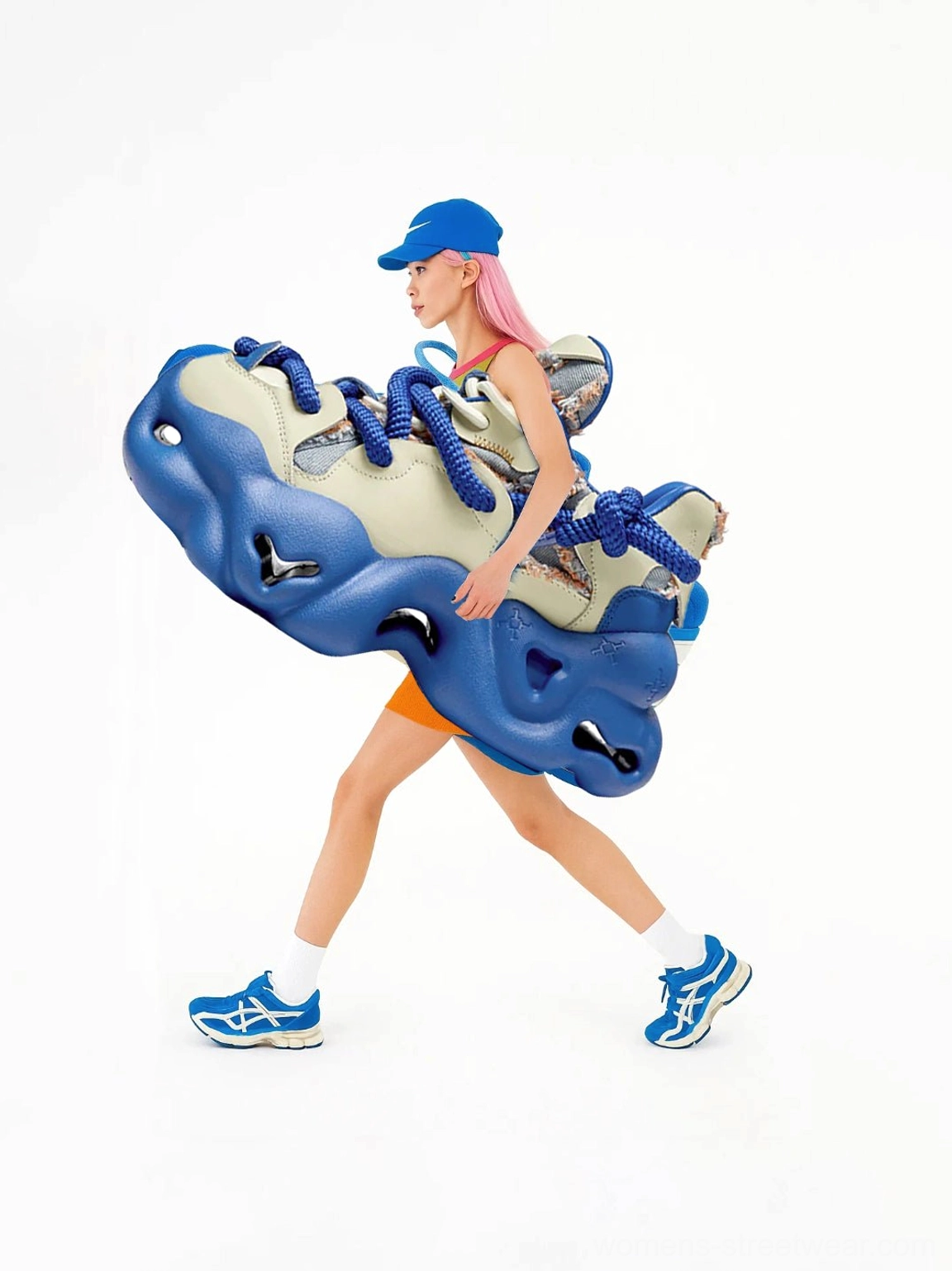 Blue cream chunky dad sneakers styled on a model in a sporty streetwear outfit with blue cap and oversized fashion styling