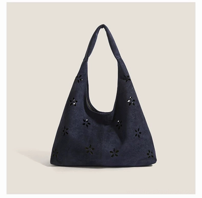 Blue daisy cutout suede-effect hobo tote bag with matching mini pouch and shoulder strap