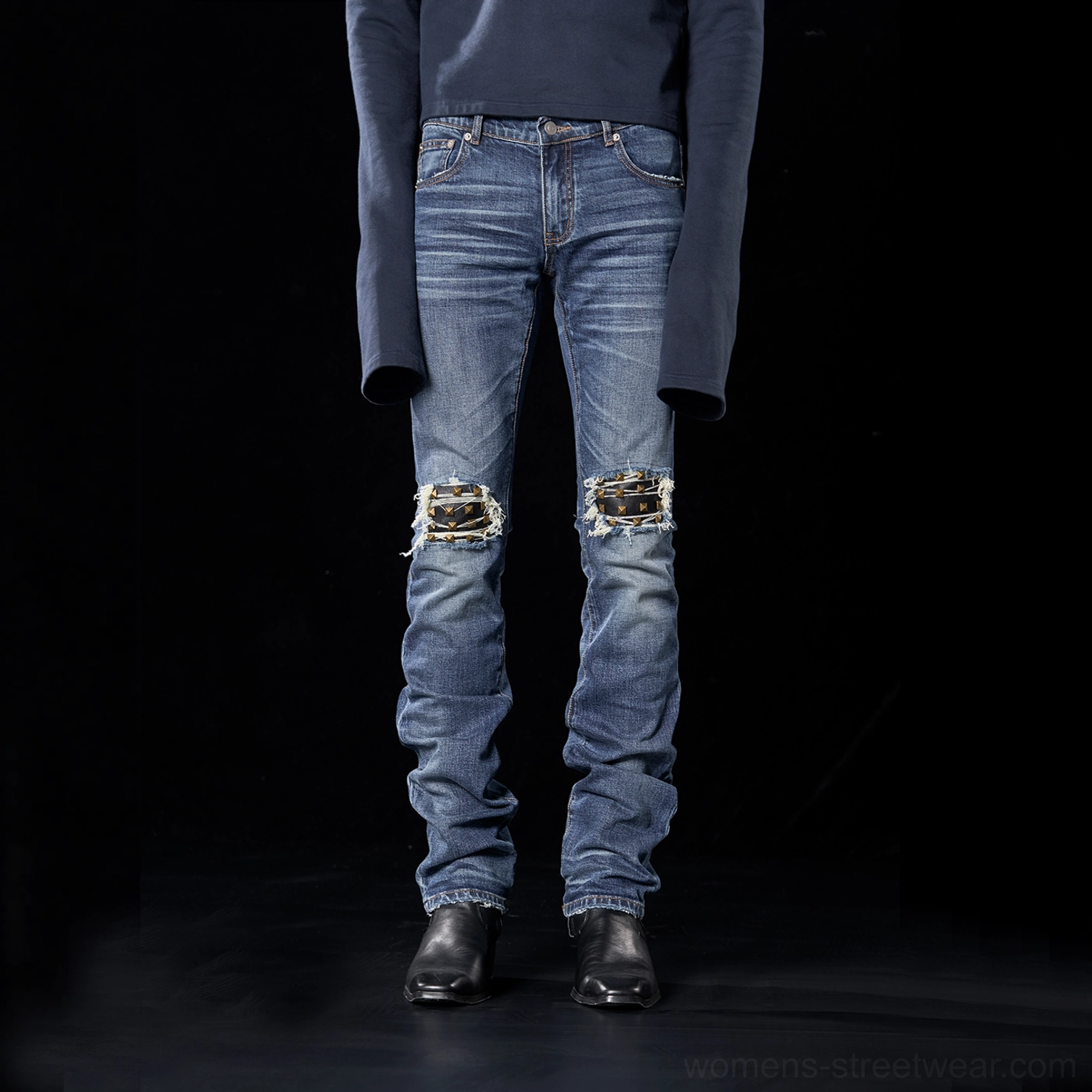 Blue distressed knee-rip slim jeans in a vintage streetwear denim wash with slim tapered legs and statement knee panel details