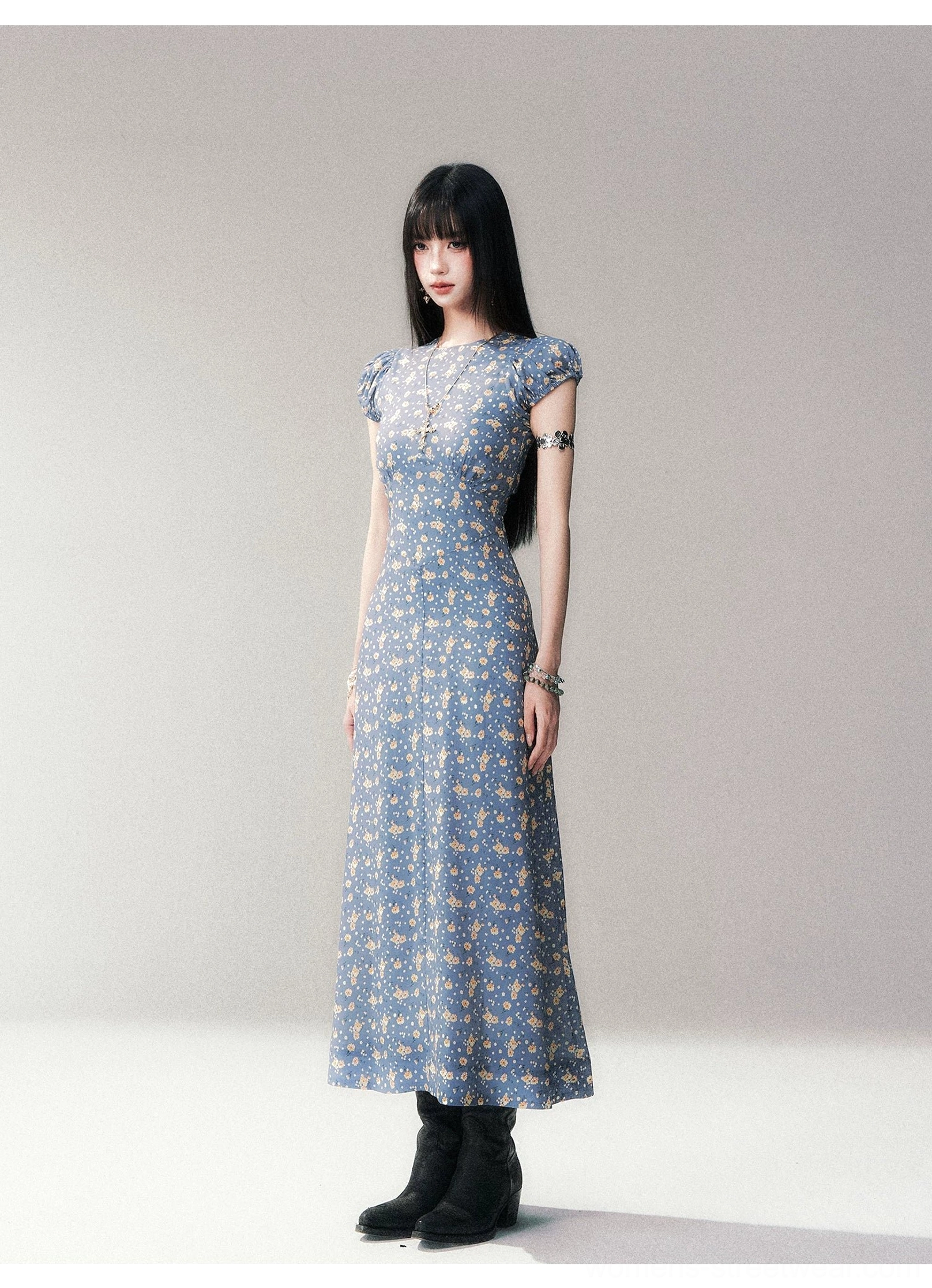 Blue ditsy floral open-back maxi dress with puff sleeves fabric and silhouette detail