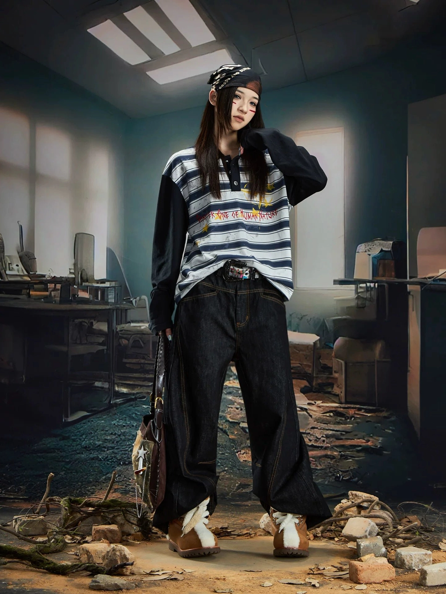 Blue grey striped rugby polo shirt with black contrast sleeves, three button collar, distressed finish, and graffiti star streetwear design