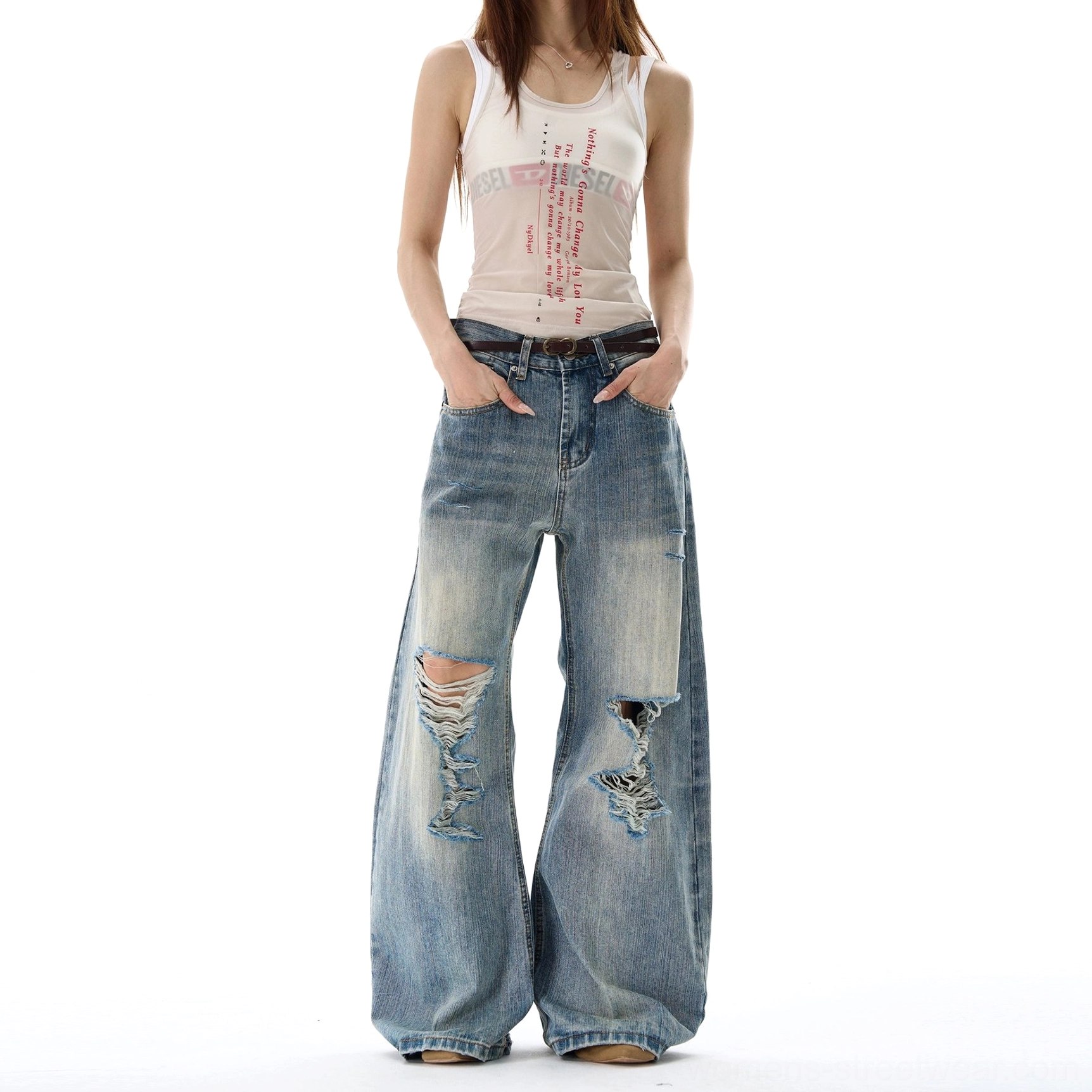 Blue hole heavy distressed wide leg denim jeans with shredded knee streetwear styling
