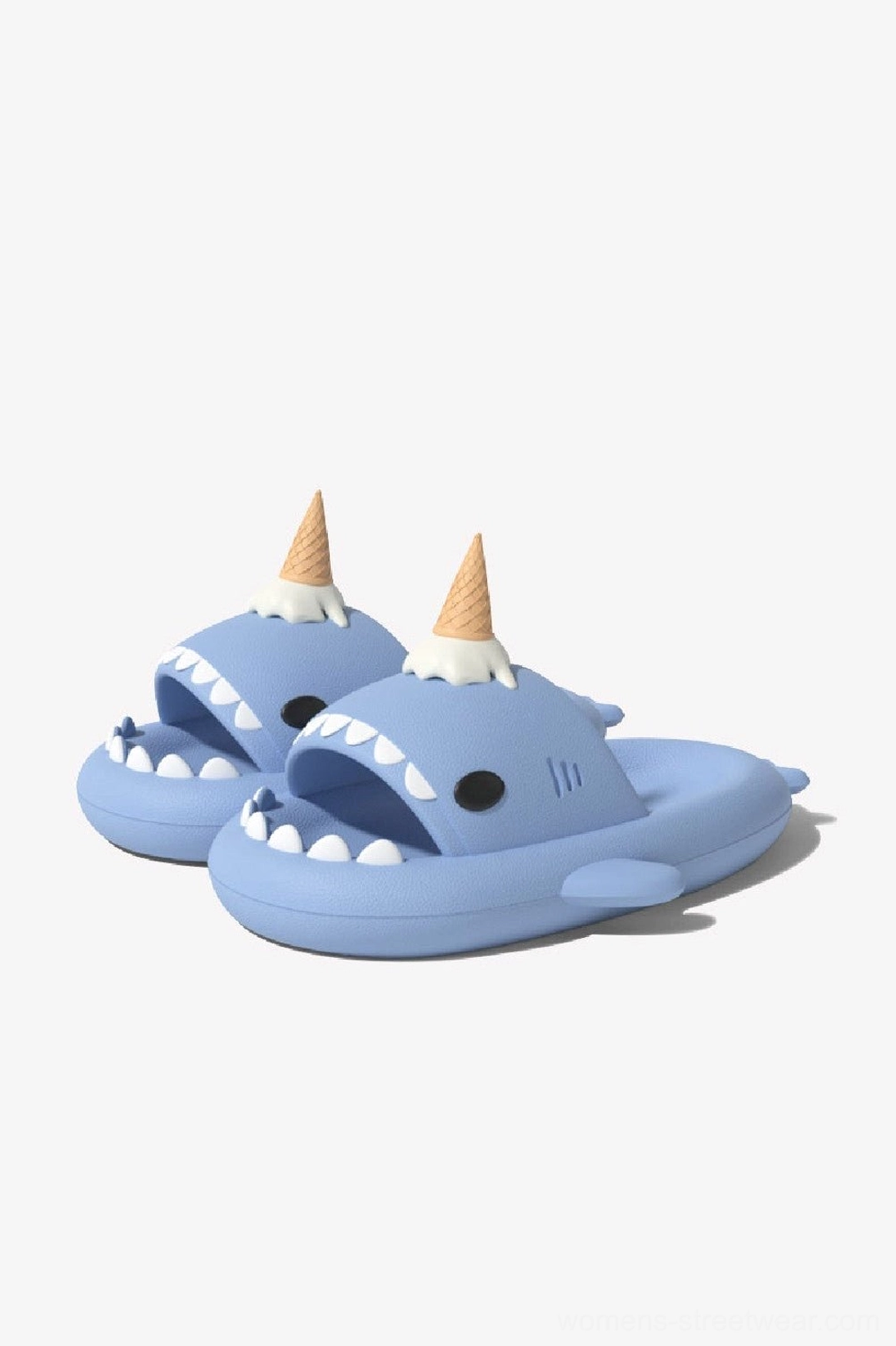 Pair of blue ice cream shark slide slippers displayed on a white studio background