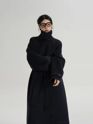 Blue Indigo oversized women's wool coat with high stand collar soft textured fabric matching waist belt and relaxed Korean streetwear silhouette