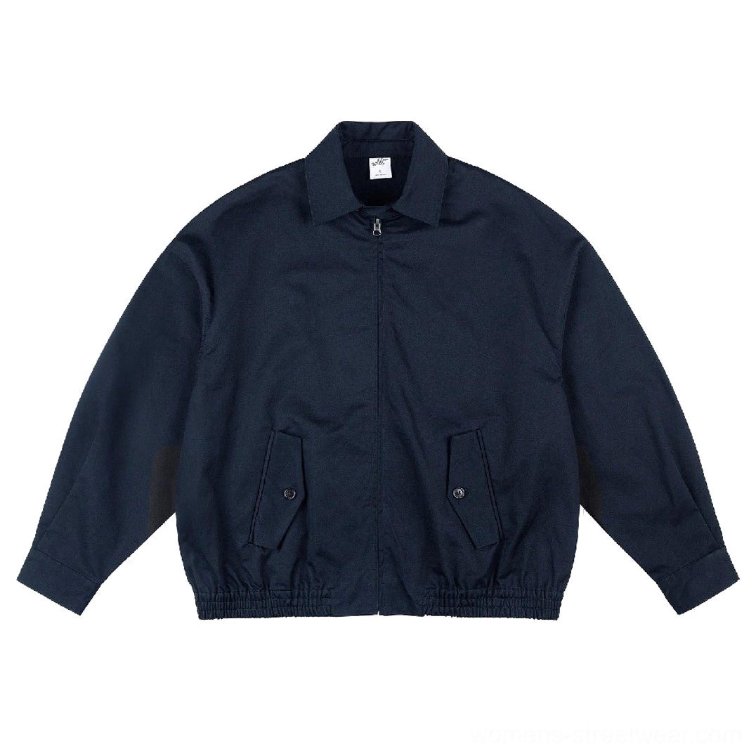 Blue oversized cotton zip-up work jacket with pointed collar button detail flap pockets and elasticized hem